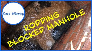 Rodding a blocked manhole