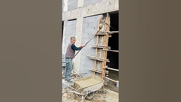 The delicate work on the construction site: vibrating and scraping fine aggregate concrete.