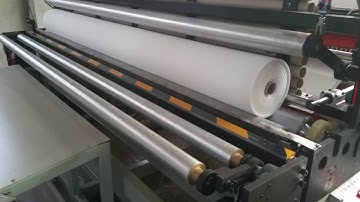 Automaitc maxi roll rewinding machine with the automatic band saw cutting machine