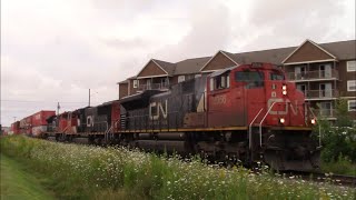 Old School Power on a Big Stack Train CN 120 w/DPU Passing thru Downtown Moncton, NB