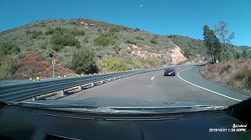 Car Overcorrects on Sweeping Highway Corner || ViralHog