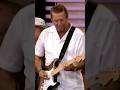 Eric Clapton performing "Tulsa Time" alongside Sheryl Crow, Vince Gill, and Albert Lee.
