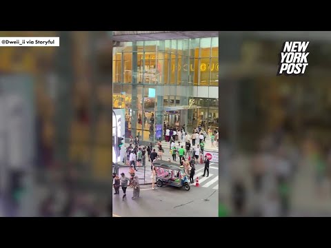 14-year-old donning American flag hat suspected of killing 3 in shooting at Thailand mall