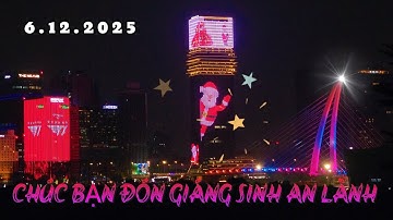 ÔNG GIÀ NOEL leo lên tháp Saigon Marina IFC 