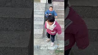 Who’s the Fastest on the Concrete Slide? #cute #twinmoments #funny