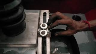 Auto parts grinding on vartical spindle type through feed duplex surface grinding machine.
