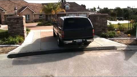 Stop the "Jar to Your Car" When Entering Your Rolled Curb Driveway