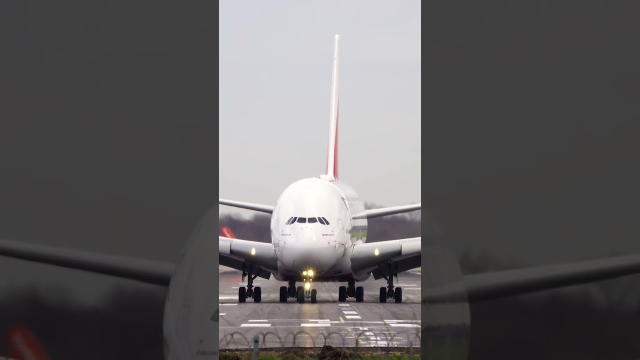 Emirates A380 Touching Down And Vacating 26L 