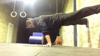 Straddle Planche Hold Against Wall