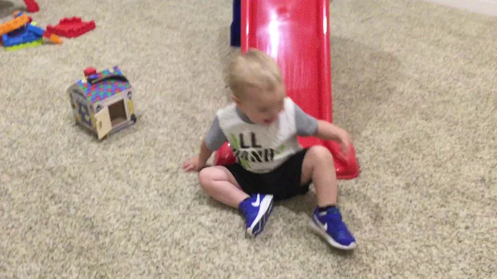 Baby brother sliding down the slide cringe warning