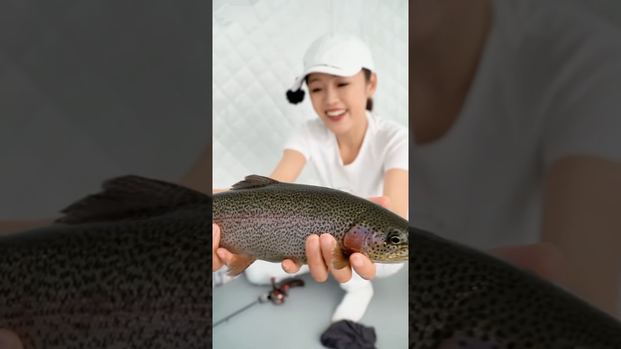 Snow fish catching by camp girl 