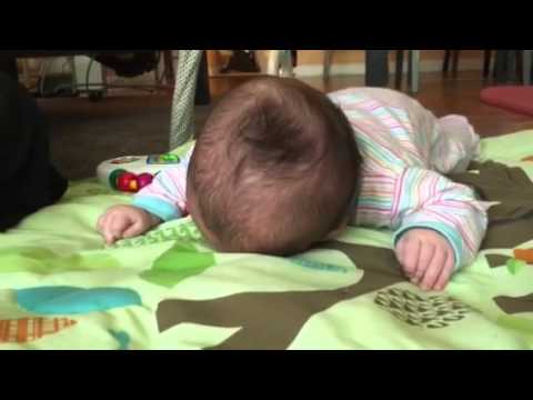 Baby Exercising Olivia Tummy Time in the Morning with Mommy Baby Exercising Olivia Tummy Time in the Morning with Mommy