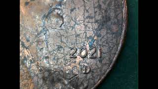 2021 D Shield penny Struck through