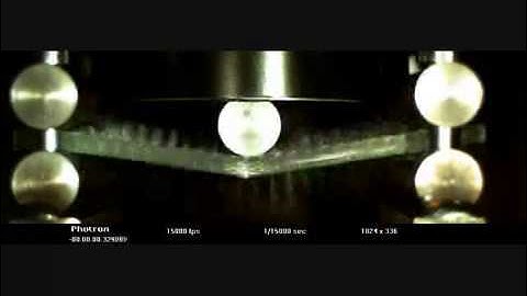 Cylinder impacting a unidirectional glass fiber reinforced composite plate experiment