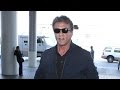 Sly Stallone Keeps A Distinctive Profile Through LAX