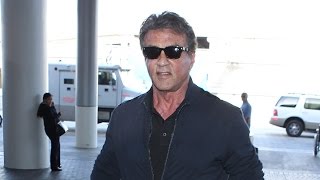 Sly Stallone Keeps A Distinctive Profile Through LAX