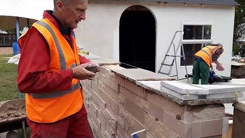 Installing copings on a wall
