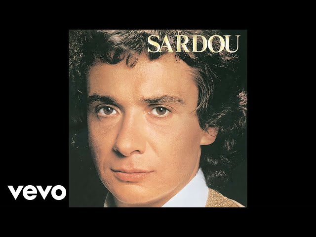 Michel Sardou - En chantant (Audio Officiel) class=