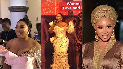 Wunmi Toriola step on stage with her tempting dress to receive best Nollywood actress award.