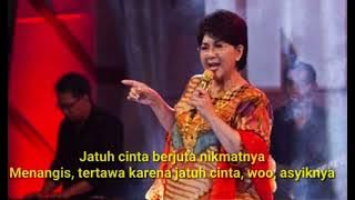 Jatuh Cinta - Titiek Puspa. Lirik dan Lagu.