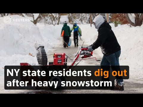 New York state residents dig out after heavy snowstorm - YouTube