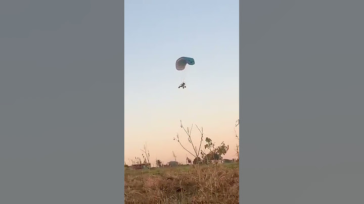 Paraglider crashes to his death after freak accident with kite flying nearby