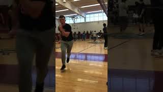 Kid throws ball that accidentally hitting a girl in the face in school gym