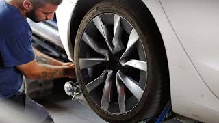 TowTrack lifting a Tesla: control, precision, performance