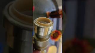 installing quick fitting plumber couplers.