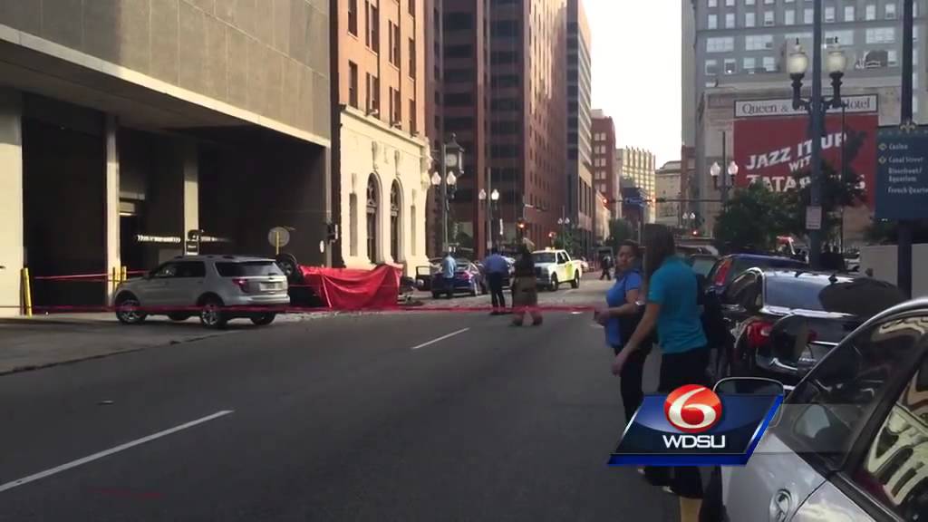 Raw Video: Car falls out of parking garage in CBD