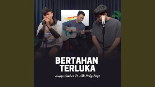 Bertahan Terluka