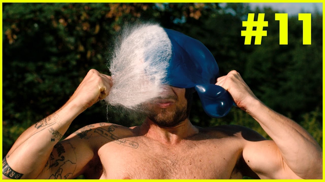 Popping Water Balloons in Slow Motion Slow Mo Experiment YouTube