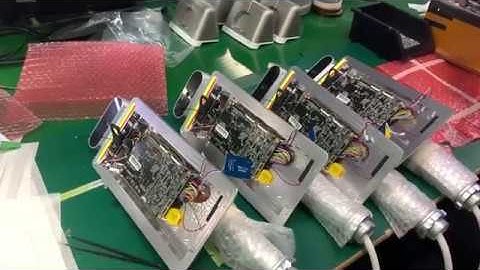 How does the worker assemble a facial recognition fever detection terminal