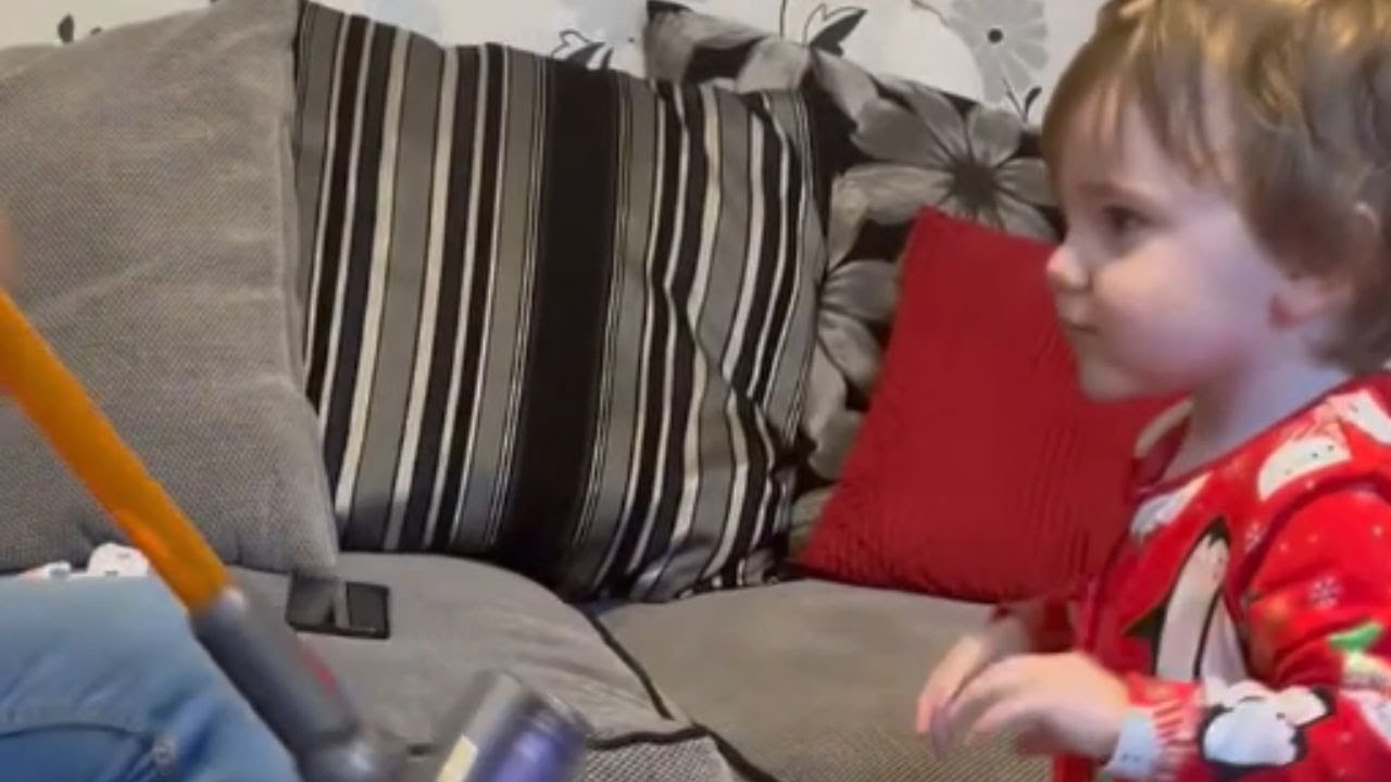 Toddler bubbles with glee after being surprised with a mini Dyson Hoover || WooGlobe