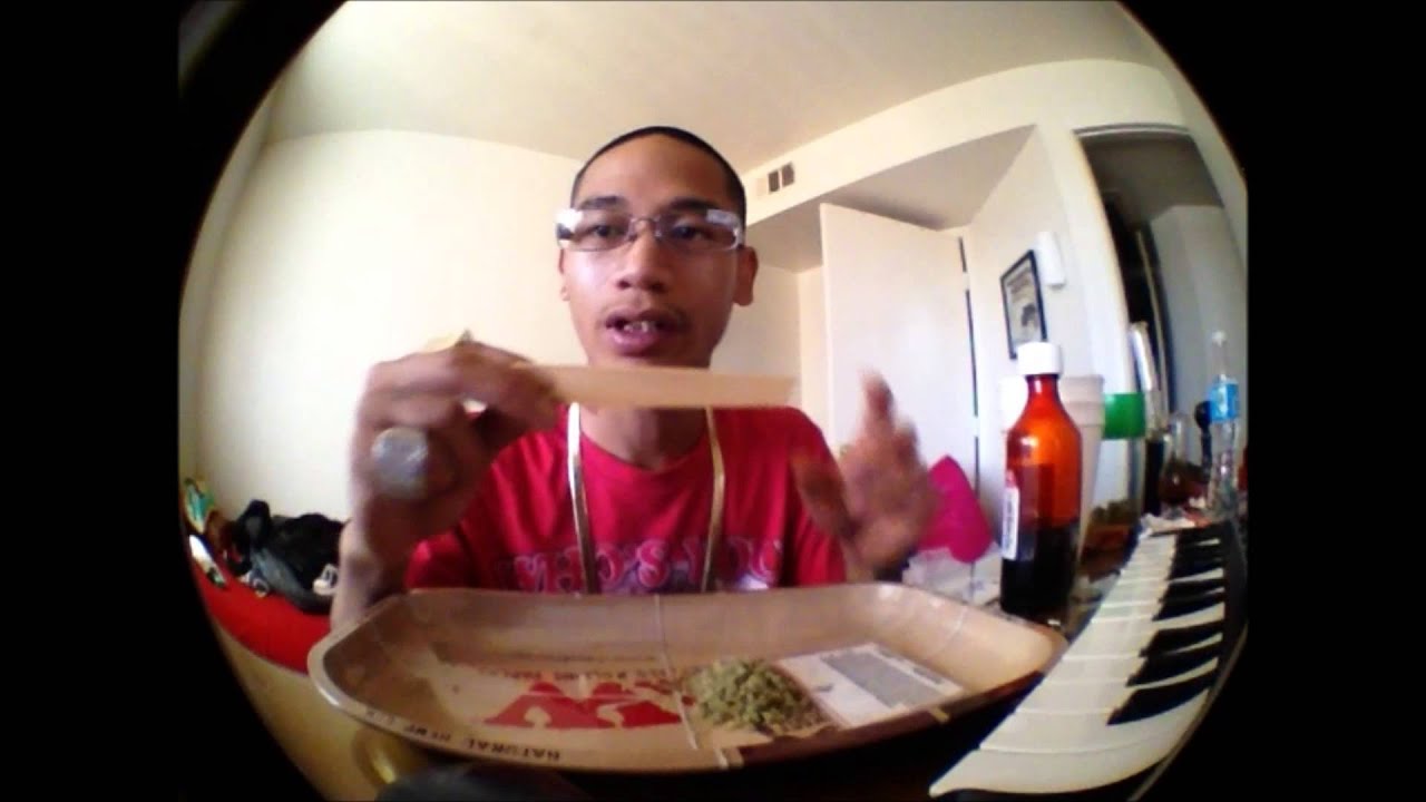 Dizzy 2 Cups ***HOW TO ROLL A DOOBIE WITH RAW PAPERS