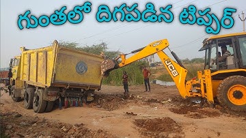 tipper truck stuck in mud || over loaded tipper rescue || tipper stuck in mud road helping jcb