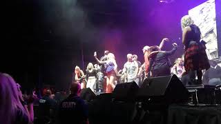 Vanilla Ice tries to dump water on annoying bitch in blue shirt  but soaks wrong girl