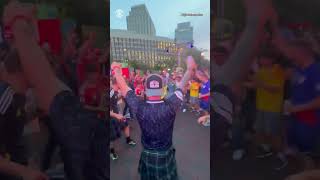 Soccer fans, local and international, hype up police officer overseeing Fan Fest in Boston #shorts