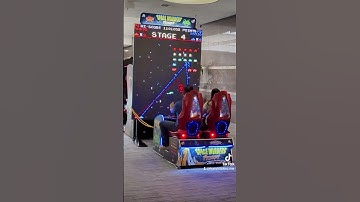 Playing Space Invaders - arcade game