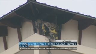Lightning strikes clock tower