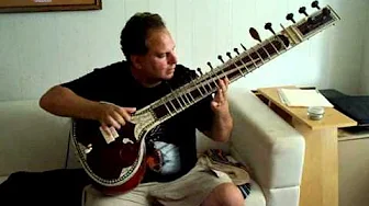 Dale in Sales playing Sitar