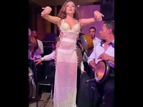 Amazing oriental belly dancer with talented darbuka player
