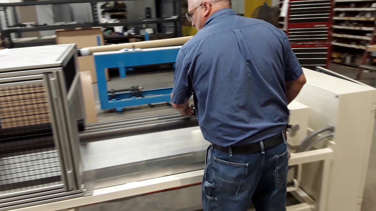 LID FEEDER & RESTACKER