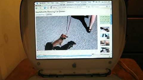 Apple Clamshell iBook playing Youtube videos