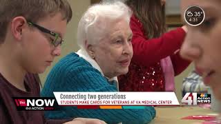 Students and seniors make Valentines for vets