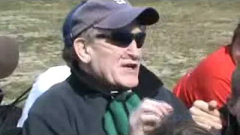 Coach Stringer tells a joke to Sewanee's Purple Ha...