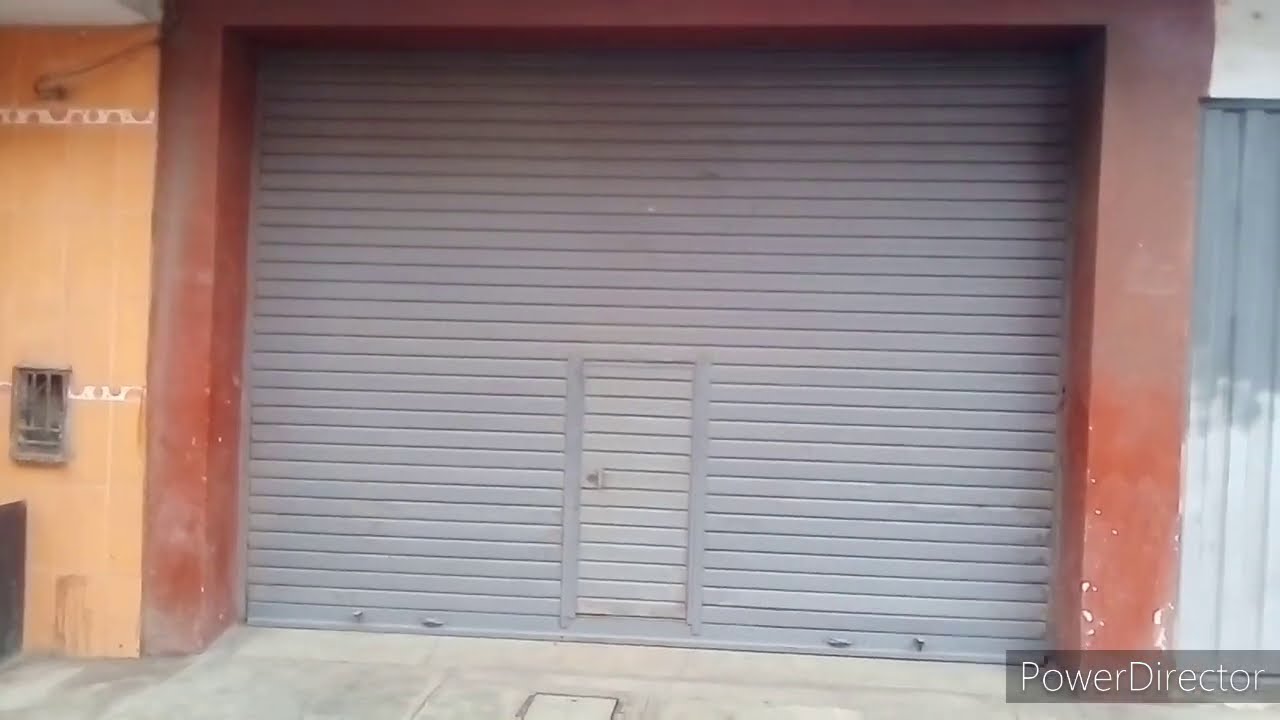 Instalación de Reja de protección para un local Comercial - YouTube