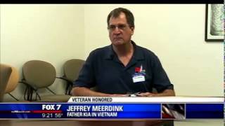 Flag re-folding ceremony for Marine killed in action