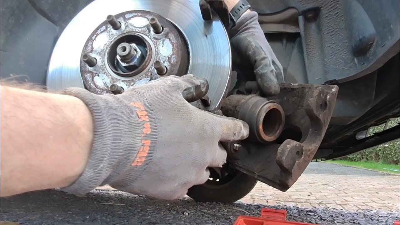 How to Change front brake pads .. Ford transit connect - YouTube