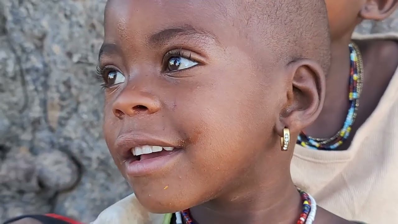 HADZABE FAMILY IN THE OPEN KITCHEN TABLE